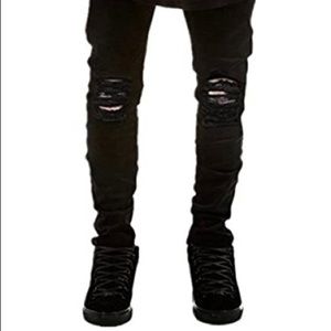 Qazel Vorrlon men’s slim fit black stretch ripped skinny jeans.
